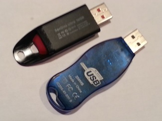 Figure 1. 16GB thumb drive (top) and 256MB thumb drive (bottom).