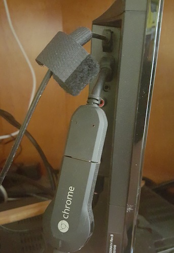 Figure 1. The Chromecast dongle on an HDTV. USB port on top, HDMI port below.